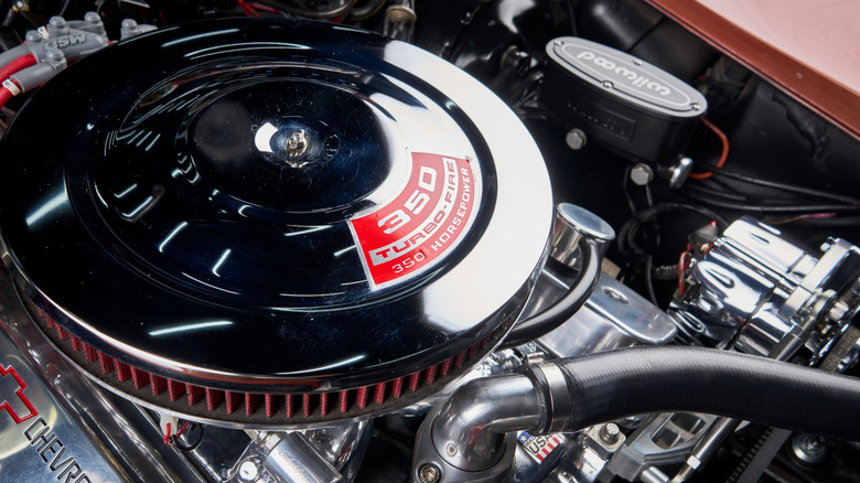 Close up view of air cleaner on 350 cubic inch small block Chevy engine.