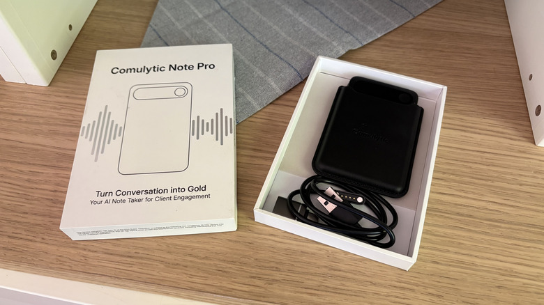 AI voice recorder with accessories in an open package