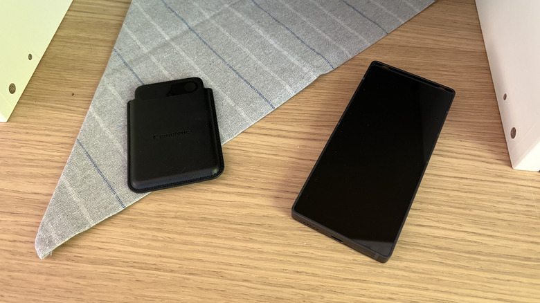 One small and one large black AI recording devices