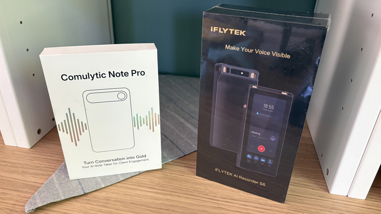 Two AI voice recorders in their respective packaging