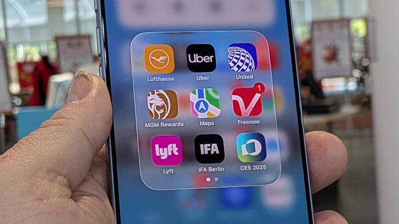iPhone 17 held in a man's hand