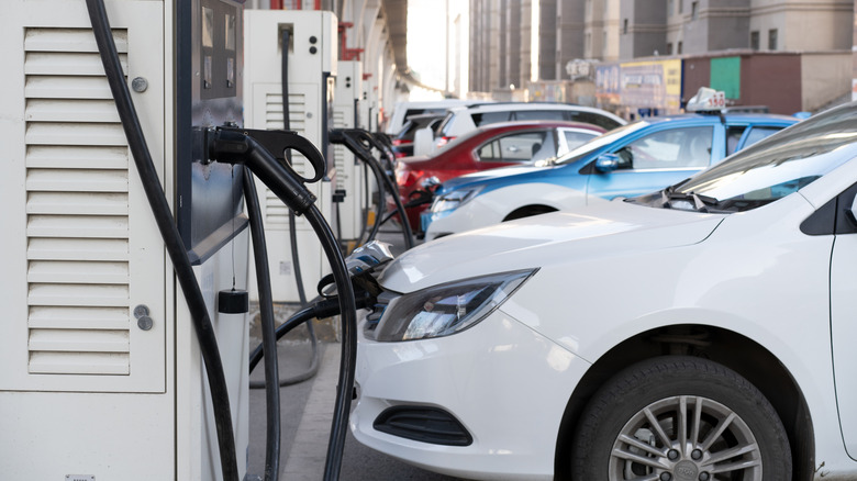 Some electric vehicles are charging at the urban public charging station in Xining City