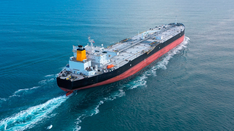 A crude oil tanker sailing in open waters.