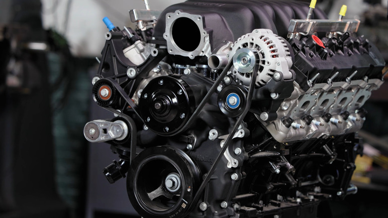 7.3L Godzilla V8 on engine stand, close-up of front-left