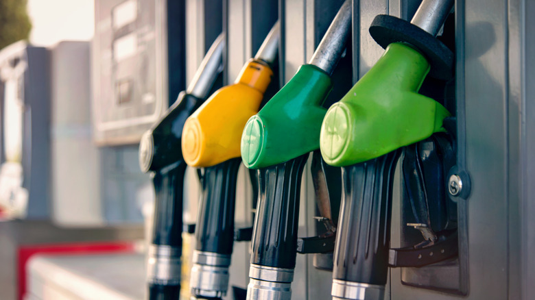 Multiple gas nozzles at a gas pump