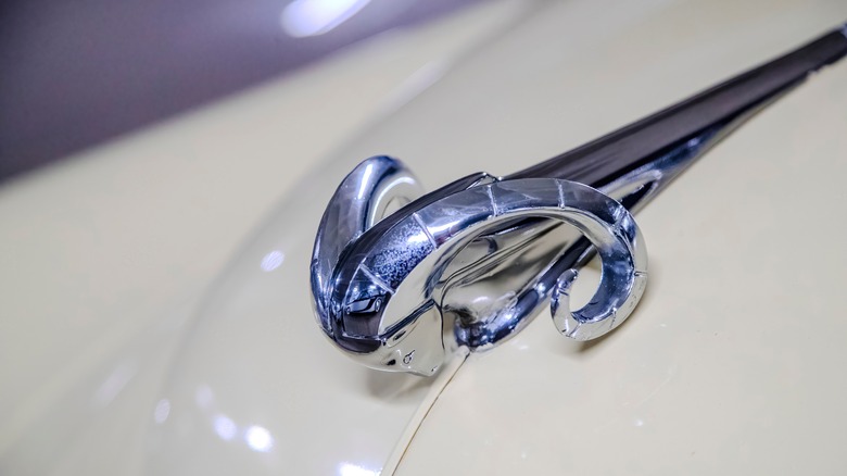Ram hood ornament on early Dodge car.