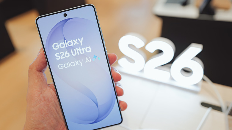 person holding Samsung Galaxy S26+