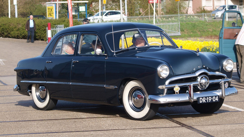 A black 1949 Ford Custom Fordor Sedan