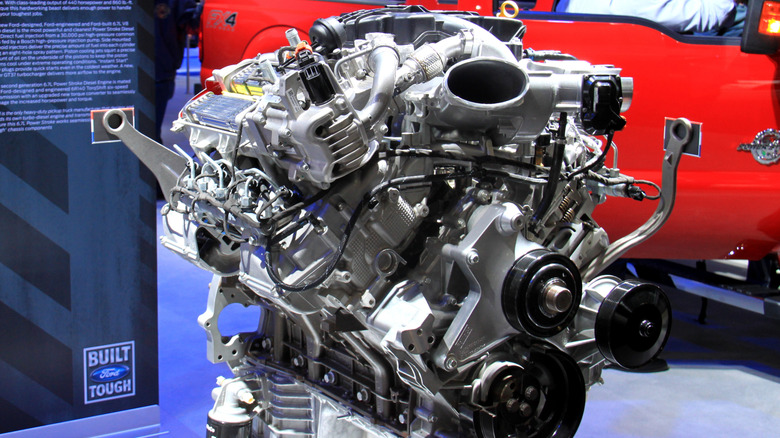 Ford 6.7L Power Stroke V8 Scorpion engine on display at an auto show