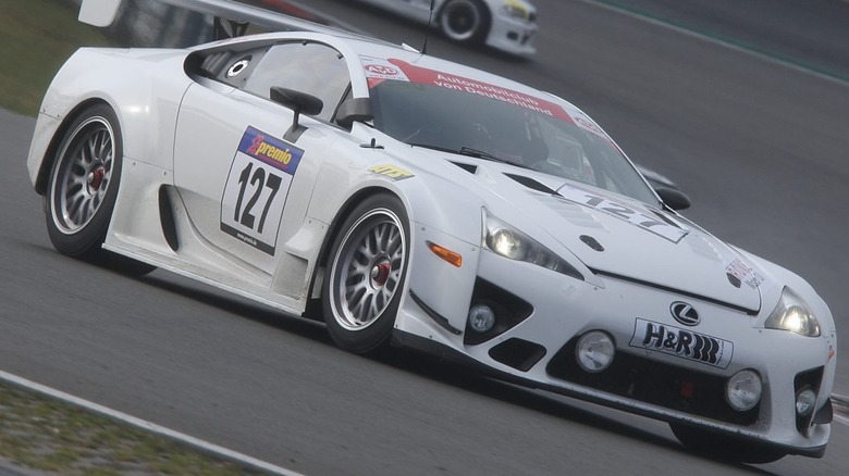 A white Lexus LFA on a racetrack.
