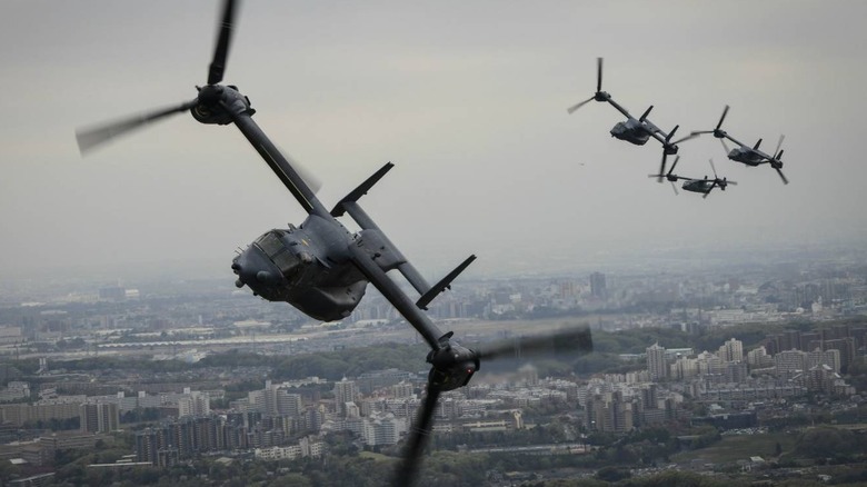 Four CV-22 Osprey assigned to the 353rd Special Operations Group Detachment 1 fly above Tokyo.
