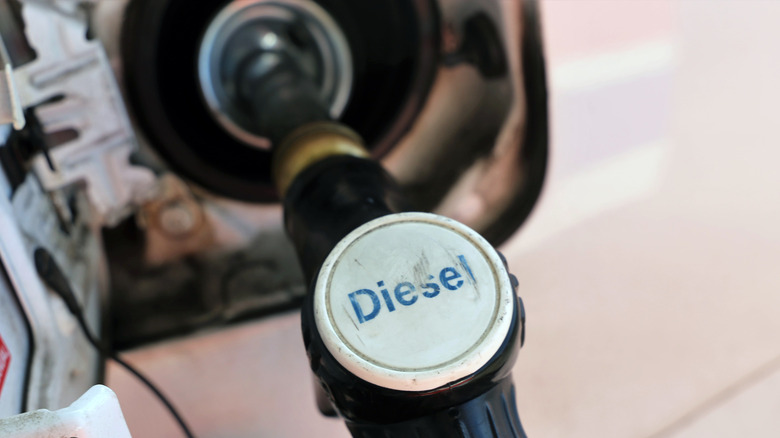 Refueling a car with diesel