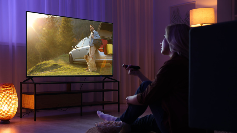 A women watching TV