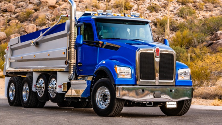 A blue Kenworth T880S parked outdoors