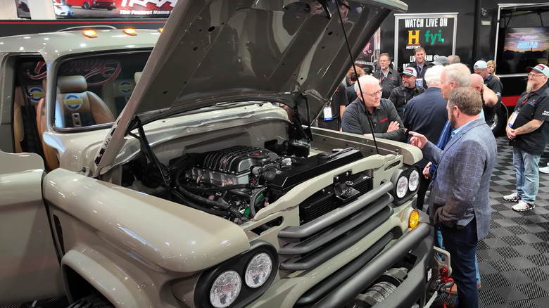 Mike Rowe's Project S.W.E.A.T. with hood open at SEMA 2024