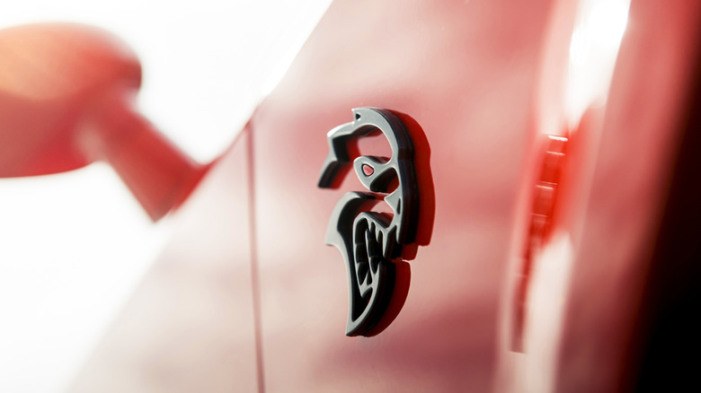 Close-up of Hellcat badging on the side of a 2021 Dodge Challenger Hellcat