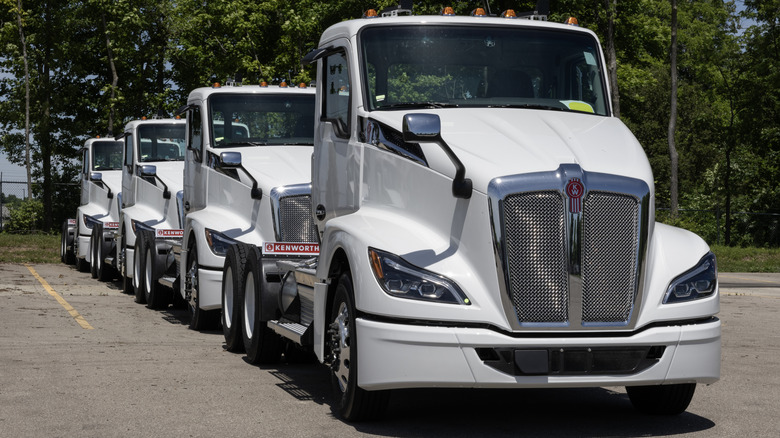 Front shot of a white Kenworth T680 tractor truck