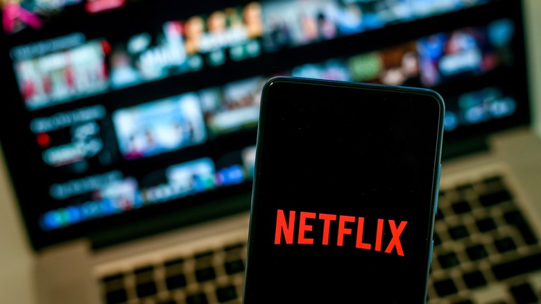 Netflix phone and laptop background