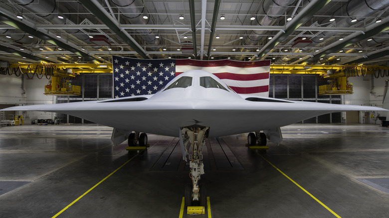 Northrop Grumman B-21 Raider on display in front of American flag