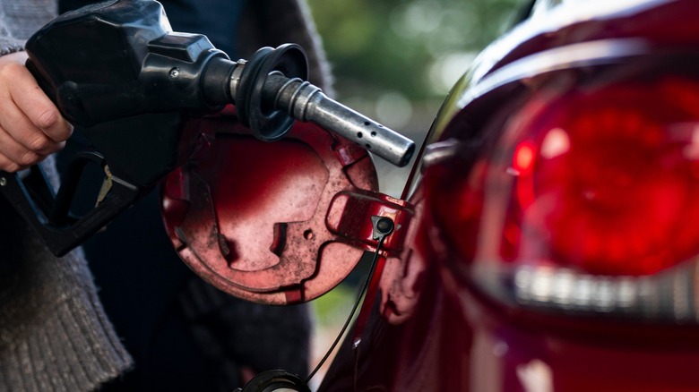Nozzle being inserted into fuel filler neck