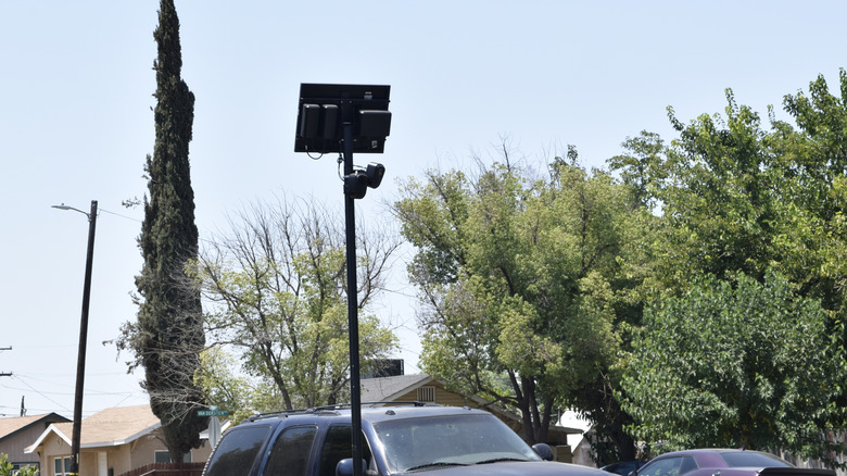 Flock Safety camera mounted on pole above traffic