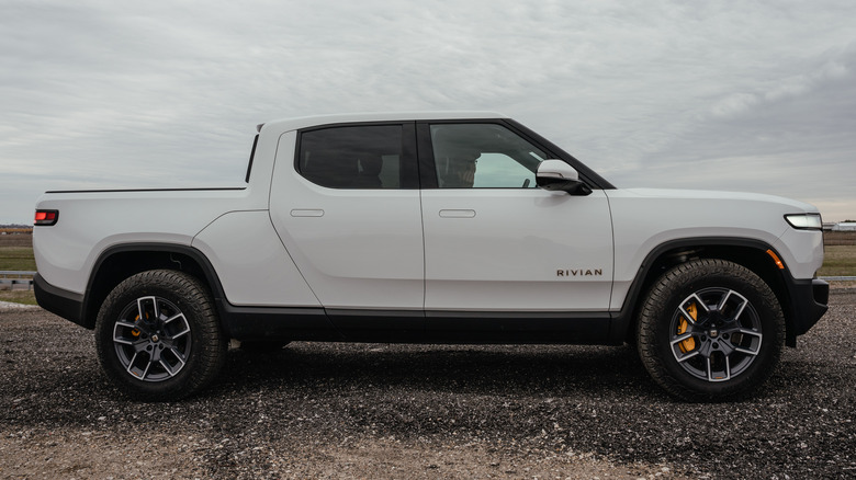 Rivian R1T passenger side parked