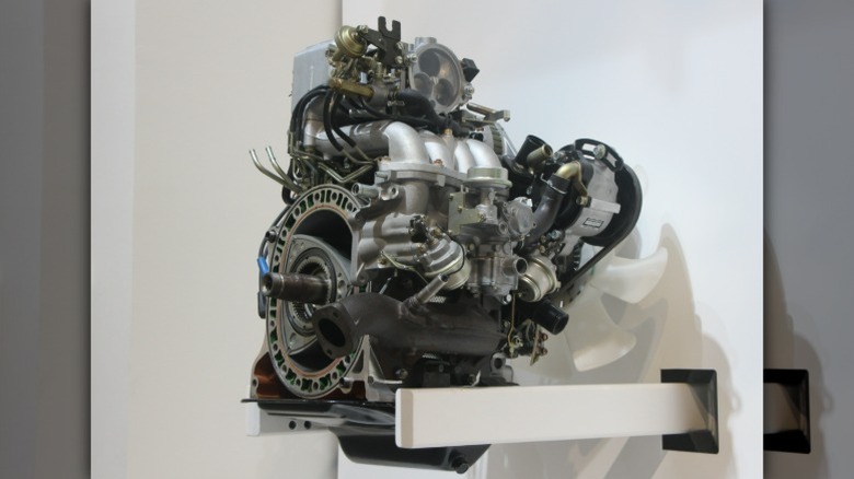 Mazda 13B rotary engine on display showing rotary combustion chamber