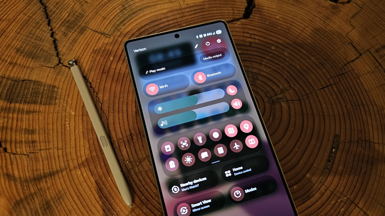 Samsung Galaxy S25 Ultra alongside S Pen on wood table