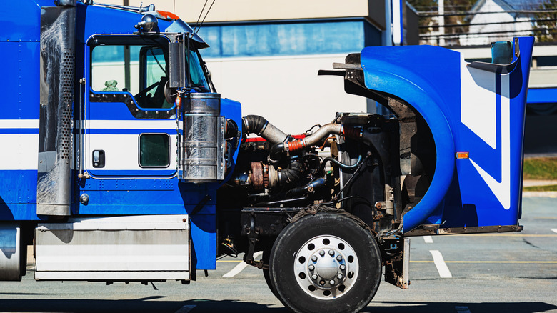 semi-truck with hood popped