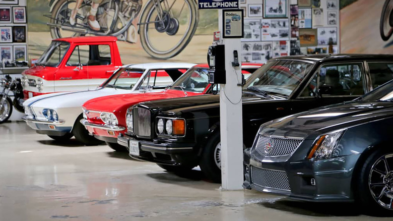 Classic vehicles parked in Jay Leno's shop