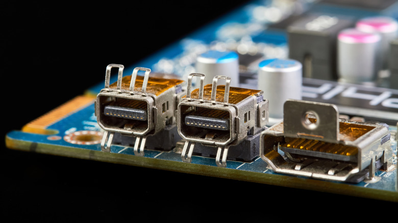 A PCB for a graphics card, showing an HDMI port alongside other video outputs