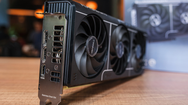 A close up shot of a Radeon 9060 XT graphics card, showing the I/O bracket