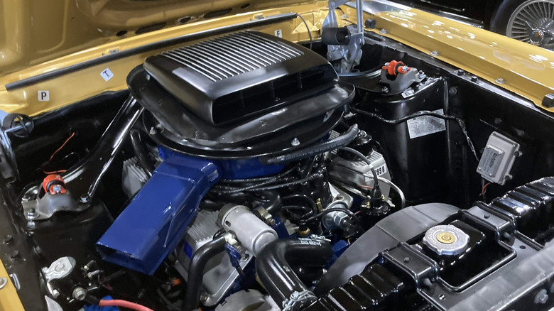 Factory 1969 Ford Mustang Boss 302 showing engine with Shaker intake fitted
