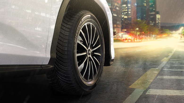 Michelin CrossClimate2 mounted on front wheel of car in rainy conditions