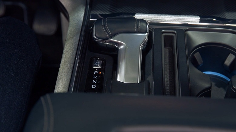 Close-up of the fold down gear shifter in a Ford F-150