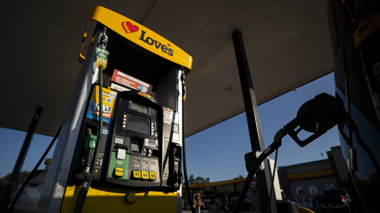 Love's gas station pump on a forecourt viewed from a low angle