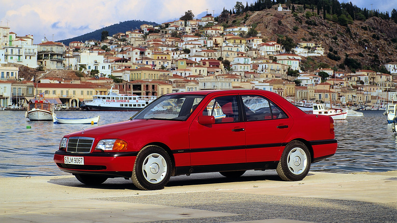 Front three quarter image of a red Mercedes-Benz C Class W202