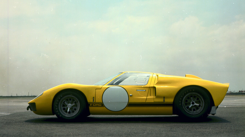 Yellow 1966 Ford GT40 MkI, left-side view