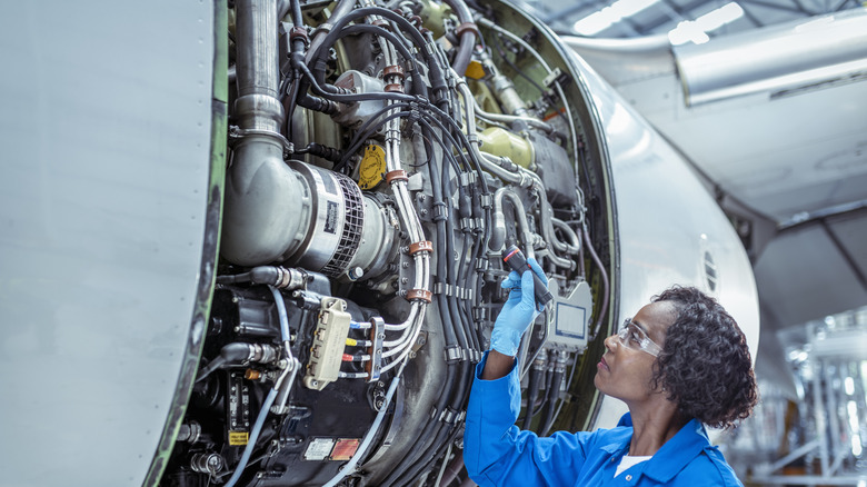 airplane inspection by a technician