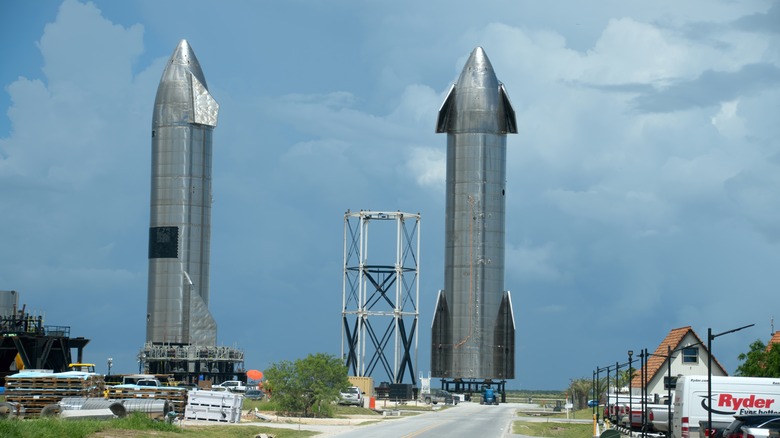 Two silver prototype SpaceX Starships