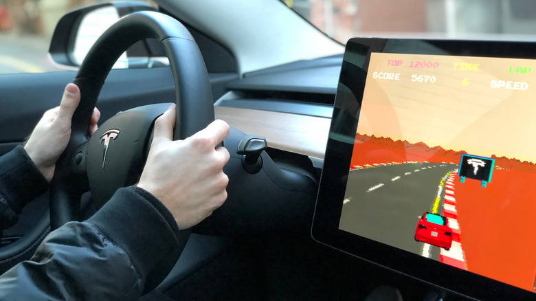 Tesla dashboard with game