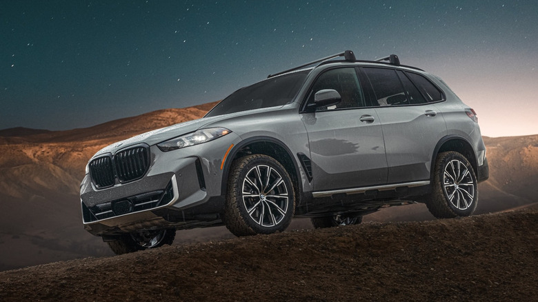 BMW X5 Silver Anniversary Edition in the desert at magic hour