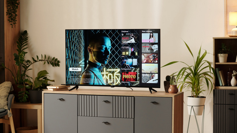 Modern TV screen in a living room.