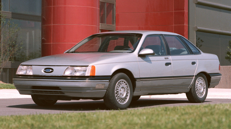 Gray Ford Taurus on street