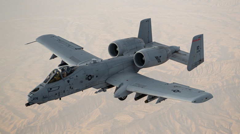 An A-10 Thunderbolt II flies over the US Central Command