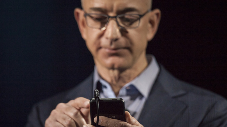 Jeff Bezos using Fire Phone