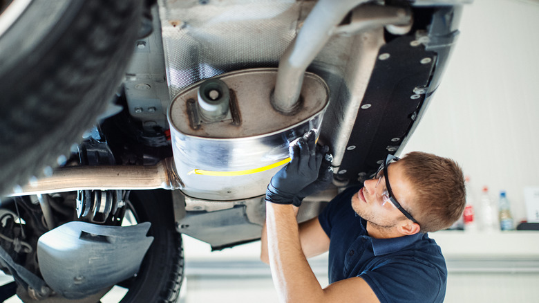 man working on a car