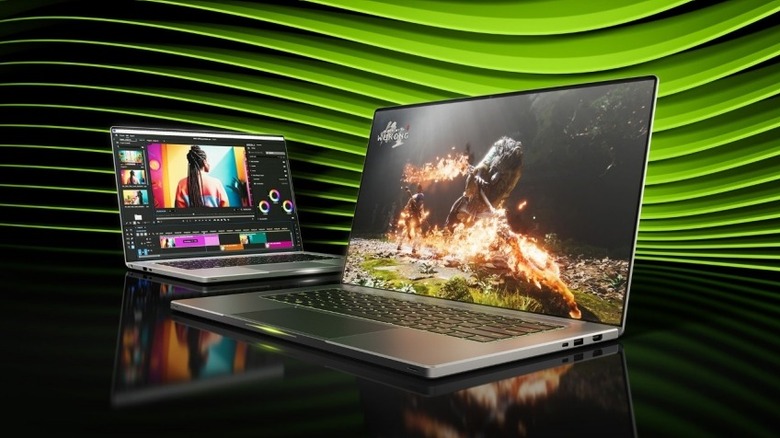 Two Nvidia laptops in front of a green background