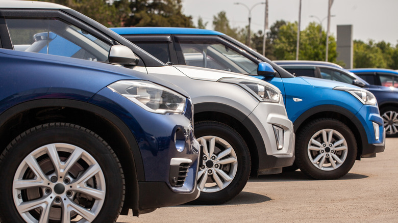 A shot of new cars on a car lot