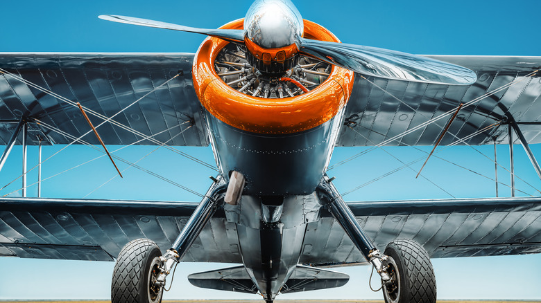 biplane sitting on runway